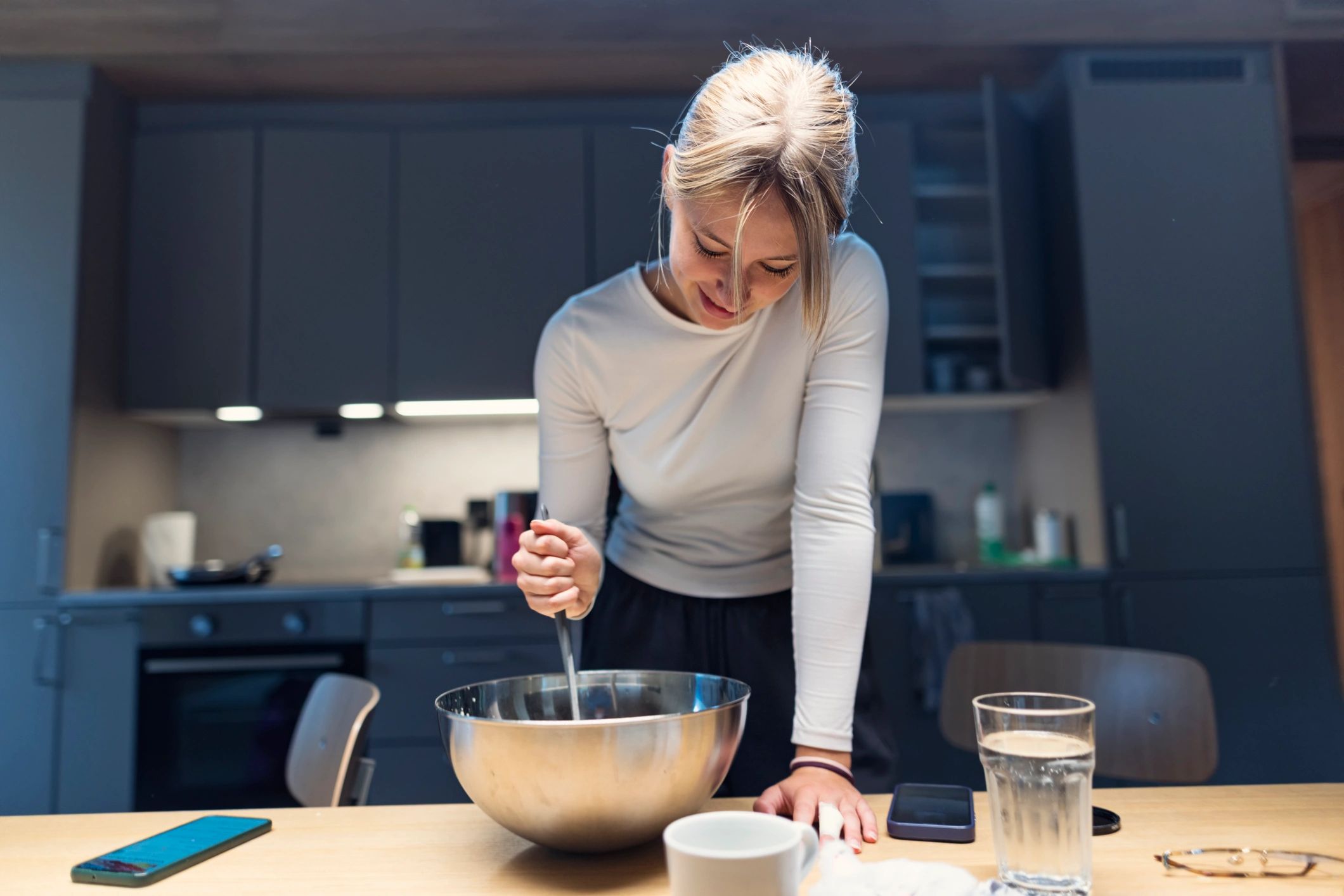 Home cook preparing ingredients in a modern kitchen